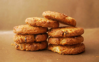 Fototapeta na wymiar Freshly baked cookies with raisins and cashew nuts