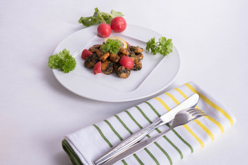 shrimp breakfast on a white plate