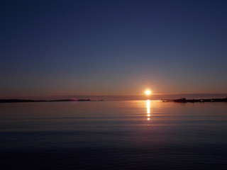 Fototapeta na wymiar Serenity: sunrise, Onega lake in Russia