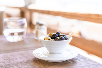 Green And Black Olives On Table