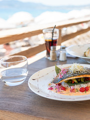 Sea Bream Fish On Restaurant Table Near The Beach