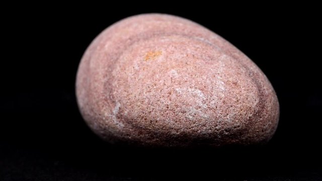 banded sandstone, red rock  on a turn table