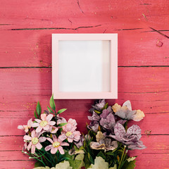 pink frame with different flowers