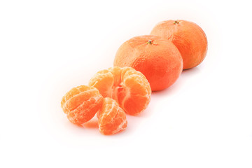 Peeled mandarin and peeled mandarin peeled off on a white background