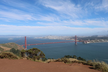 Fototapeta na wymiar View of the Sanfrancisco Bay with the Golden Gate Bridge in the background in bright colors
