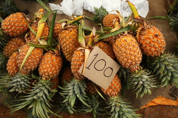  bunch of fresh ripe pineapples on the market in Sri Lanka
