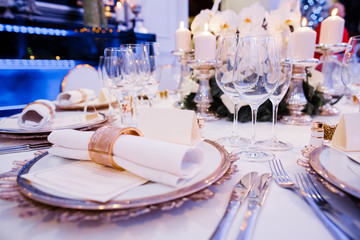 Empty glasses in restaurant. Table setting for celebration