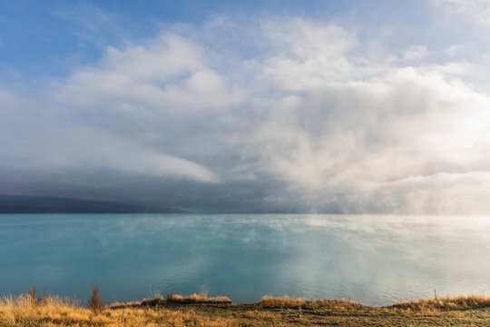 New Zealand, Oceania, South Island, Canterbury, Ben Ohau, Clouds over Lake Pukaki and Southern Alps (New Zealand Alps)