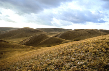 Fototapeta na wymiar Steppe hills in the fall, Ural mountains