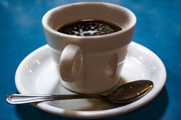 white cup scofe cup of coffee