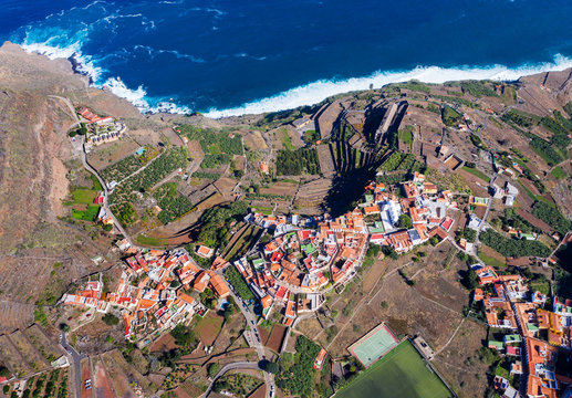 Spain, Canary Islands, Agulo, Aerial view of town lying at edge of coastal cliff
