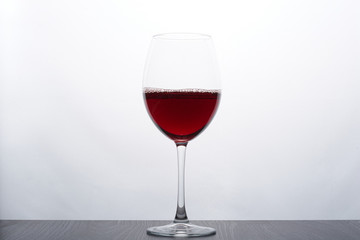 glass of red wine isolated on white background