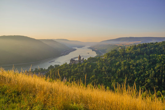 Germany, Rhineland Palatinate, Bacharach, Stahleck Castle, Upper Middle Rhine Valley in the evening