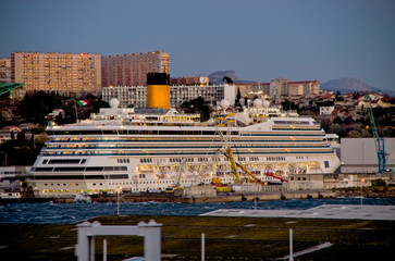 Cruiseship or cruise ship liner in dry dock for maintenance or refurbishment works in Marseille