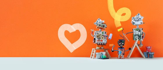 Three robots artists designers, orange wall background. One of the cyborgs painted a heart with...
