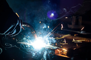 The process of joining metal by welding. Creates a strong connection at the atomic level.