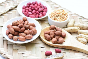 Dried peanuts (Arachis hypogaea) peanuts in shells, whole and chopped in containers