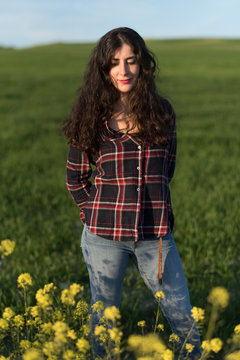 Pretty woman in spring portrait looking at camera