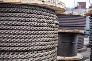 Iron new rope on a reel. Sharpness on the left.