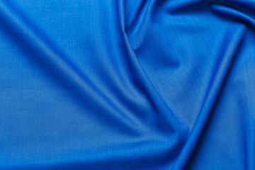 Blue fabric cloth texture. abstract texture background with soft waves.