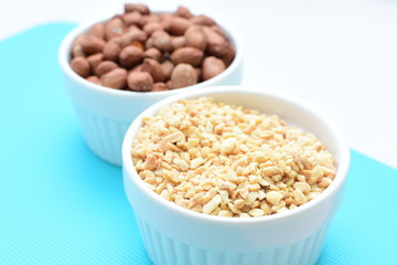 (Arachis hypogaea) chopped peanuts in containers