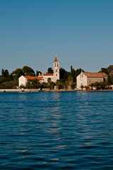 Fototapeta na wymiar Vis harbour with the Monastery in distance, Dalmatia, Croatia