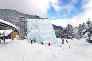 People play ice climb sport in Japan outdoor recreation center