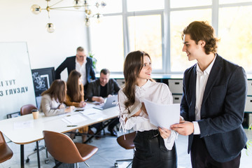 Business people analyzing financial data at the meeting desk