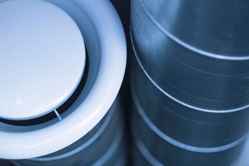 exhaust diffuser and duct in a close-up ventilation system. front and back background blurred bokeh