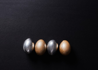 golden easter egg on black background