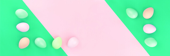 Happy Easter banner of tender dyed pastel easter eggs lined on pink and green background in flat lay with copy space