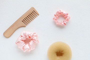 wooden Hairbrush, barrette and Pink Scrunchy isolated on white. Flat lay Hairdressing tools and accessoriesas Color Hair Scrunchies, Elastic Hair Bands, Bobble Sports Scrunchie Hairband