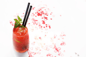 Strawberry mojito, a fruity refreshing drink. Colorful, appetizing drink served in glass. Culinary Photography.