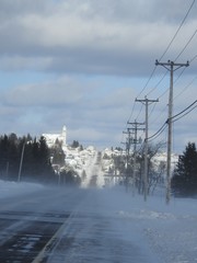 The road to the village of Sainte-Apolline in winter