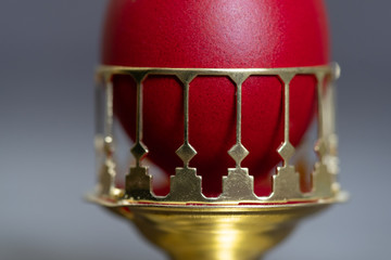 Red Easter Egg In Golden Holder Detail