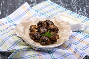 snack of grilled mushrooms with herbs
