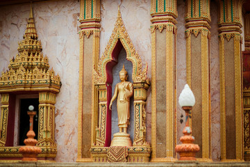 temple in thailand among greenery