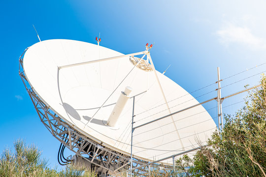 satellite antenna for receiving and transmitting information in electromagnetic waves via satellites in orbit