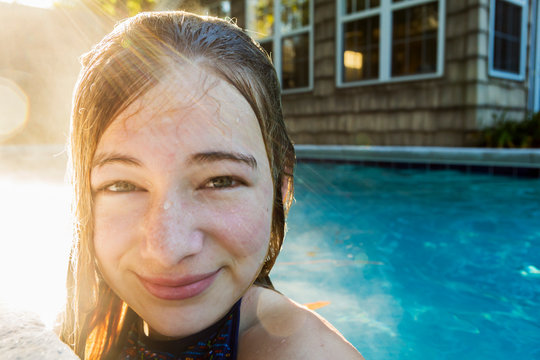 Portrait of a teenage girl in a swimming pool, head and shoulders,St Simon's Island
