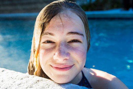 Portrait of a teenage girl in a swimming pool, head and shoulders,St Simon's Island
