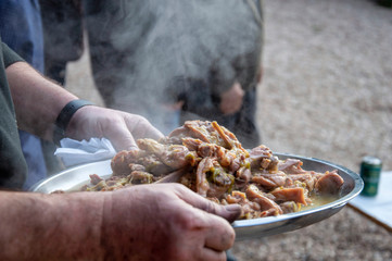Fried Lamb with Garlics in a Stainless Steel Tray for Lunch with Several Friends