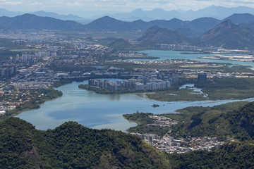 Former swamp lands and lakes now neighbourhood of Rio de Janeiro with mountains in the background