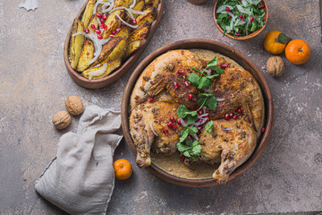 georgian cuisine - chkmeruli, grilled chicken with cream and garlic sauce