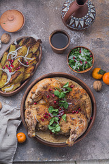 Pan fried chicken with cream sauce, potato, and salad