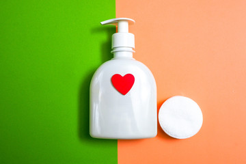 Close-up cotton pad hygienic cosmetic and healthcare accessoryand cream