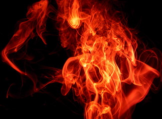 Fototapeta premium Red smoke on black background