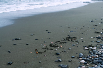 Word Cyprus written on beach sand