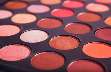 closeup of make-up palette with many colors