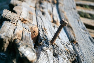 VERY LARGE AND LONG SCREW TO HOLD THE WOODEN TABLES OF A FISHING BOAT