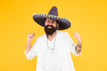 a fun accessory. Man in festive mood at party celebrating. guy happy festive outfit. his spanish costume. Cinco de Mayo Mexican celebration. travel to mexico. man in mexican sombrero hat © be free